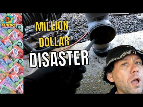 Man in a hat looks surprised next to machinery labeled "Million Dollar Disaster," with colorful currency graphics on the side.
